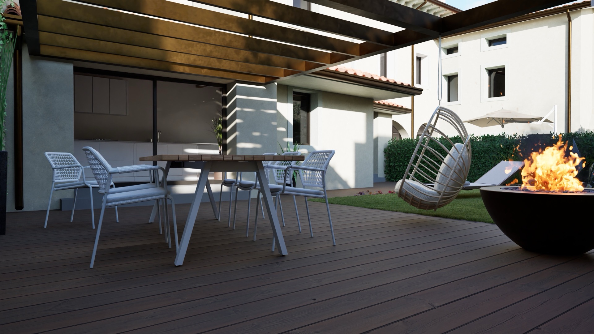 Terrazza in legno con braciere e poltrona sospesa